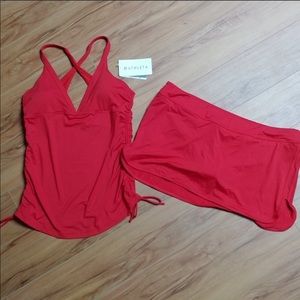 Red tankini and red swim skirt